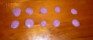 This is an image of ten purple blobs of slime on a desktop